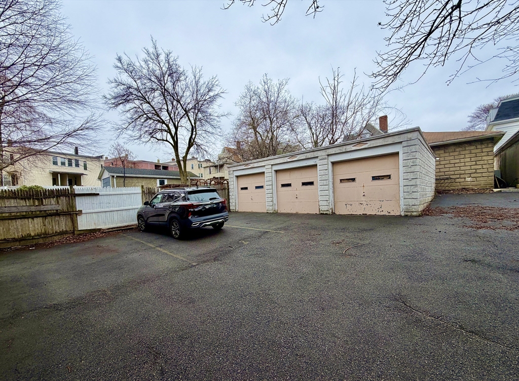 33-35 Sewall Street Somerville, MA 02145 - Photo 15 of 15 a car parked in front of house