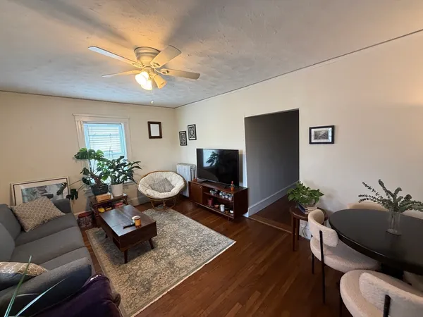 a kitchen with sink cabinets and appliances