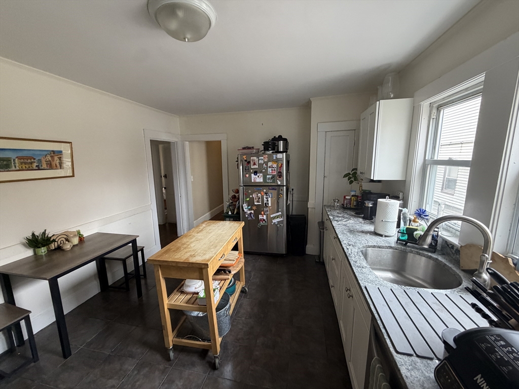 33-35 Sewall Street Somerville, MA 02145 - Photo 6 of 15 a dining room with furniture and window