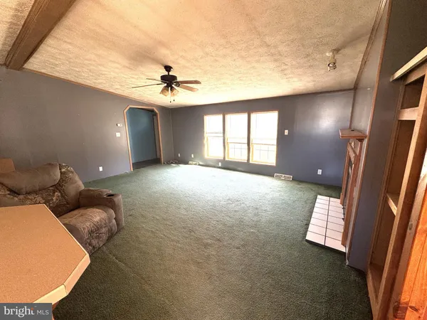 a view of livingroom and workspace