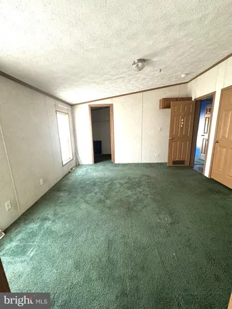 a view of an empty room with window