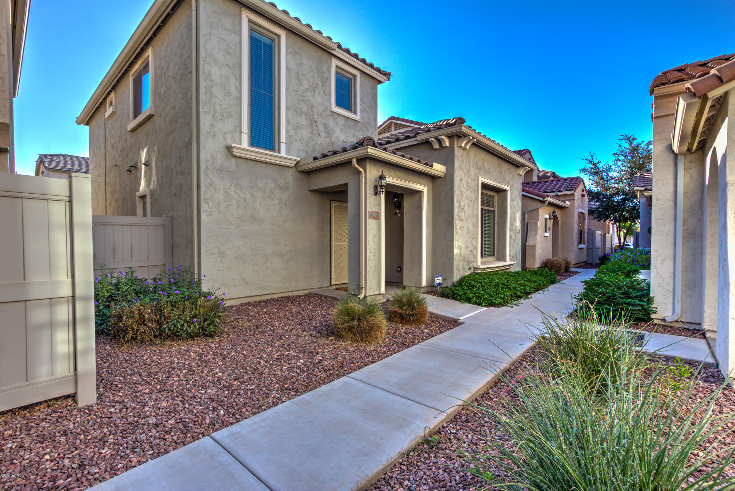1935 West Davis Road Phoenix, AZ 85023 - Photo 1 of 30 a front view of a house with garden