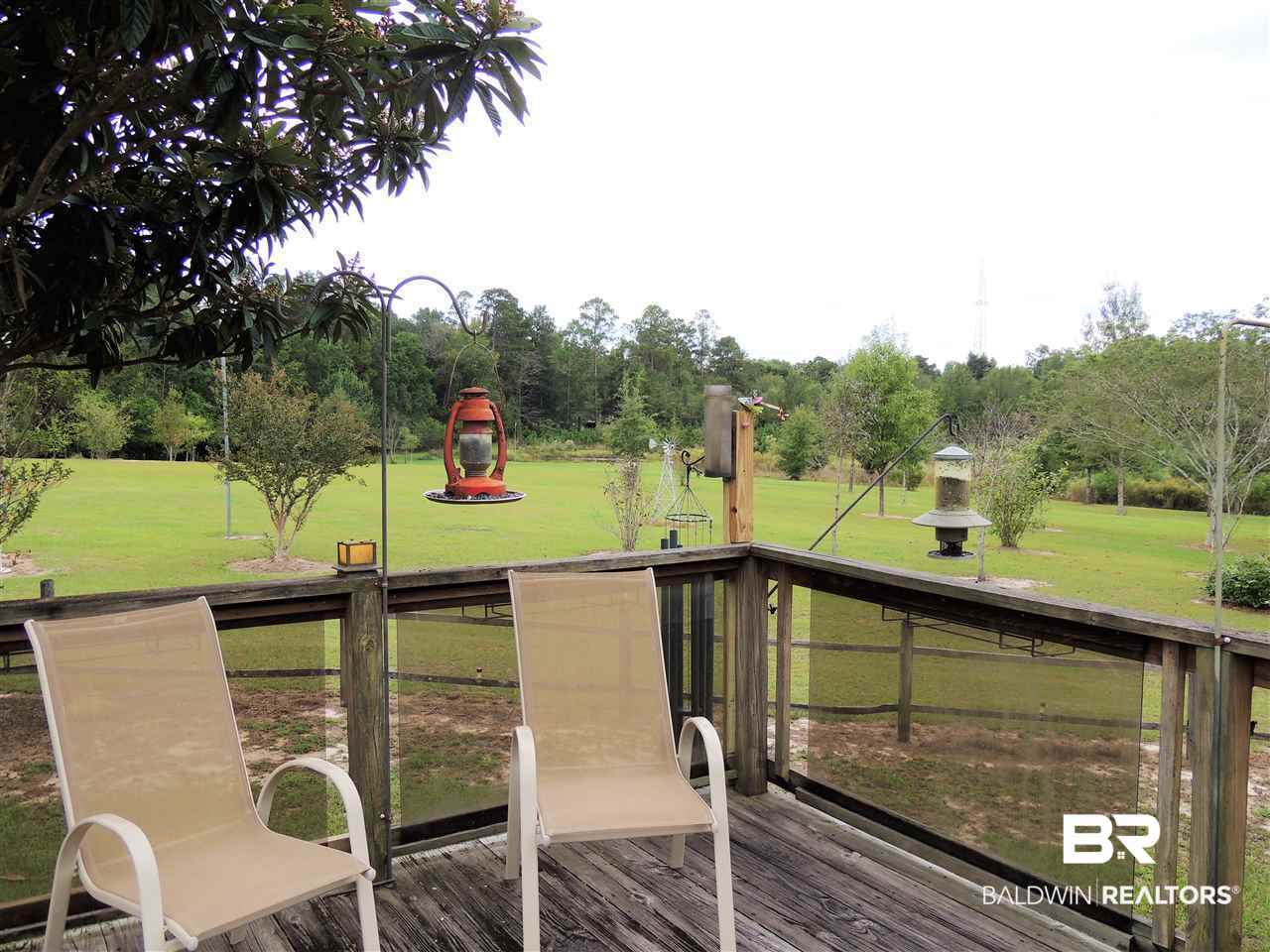 722 Shoffner Street Brewton, AL 36426 - Photo 35 of 38 Side deck off of screened in porch
