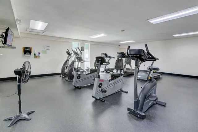a view of a room with gym equipment