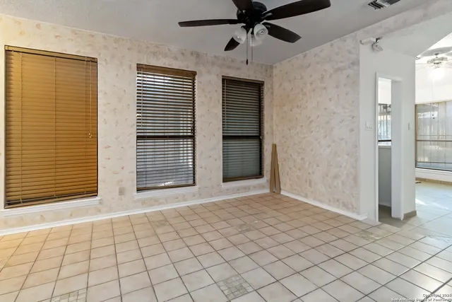 a view of an empty room and window