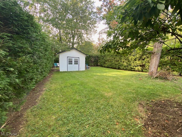 1244 Brainard Road Lyndhurst, OH 44124 - Photo 31 of 33 View of yard with a storage shed. Possible Man Cave or She-Shed
