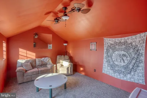 a house with trees in the background