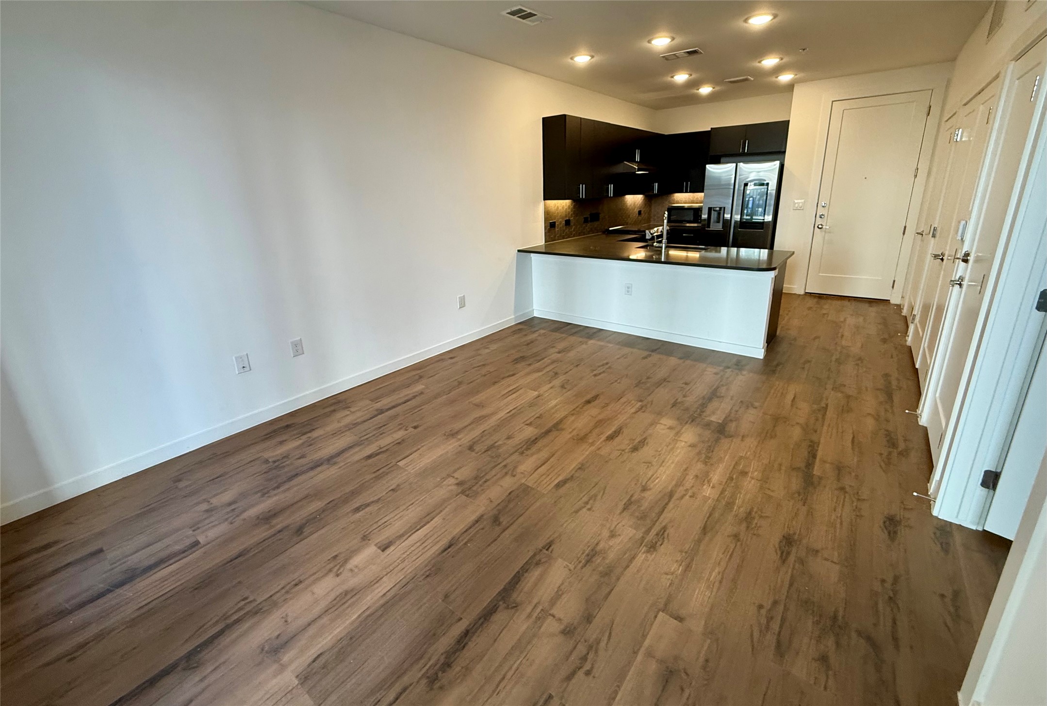 4801 Springdale Road, Unit 1106 Austin, TX 78723 - Photo 8 of 22 Open living area flowing directly into the kitchen.