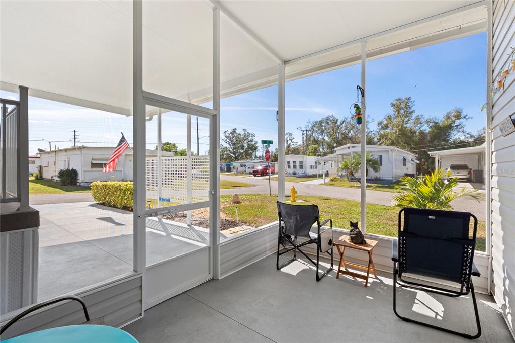 4104 11th Street East Ellenton, FL 34222 - Photo 11 of 20 a view of a swimming pool with a lounge chair