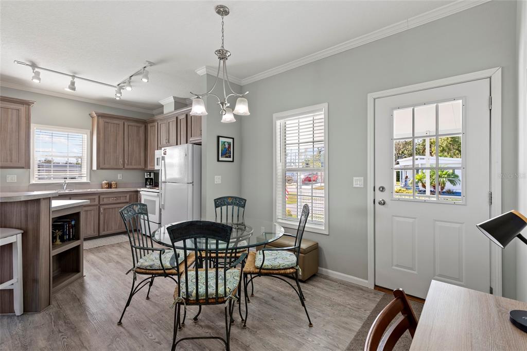 4104 11th Street East Ellenton, FL 34222 - Photo 5 of 20 a view of a dining room with furniture and window