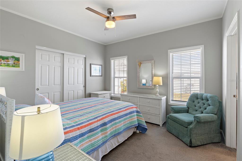 4104 11th Street East Ellenton, FL 34222 - Photo 7 of 20 a bedroom with a bed couch and a window