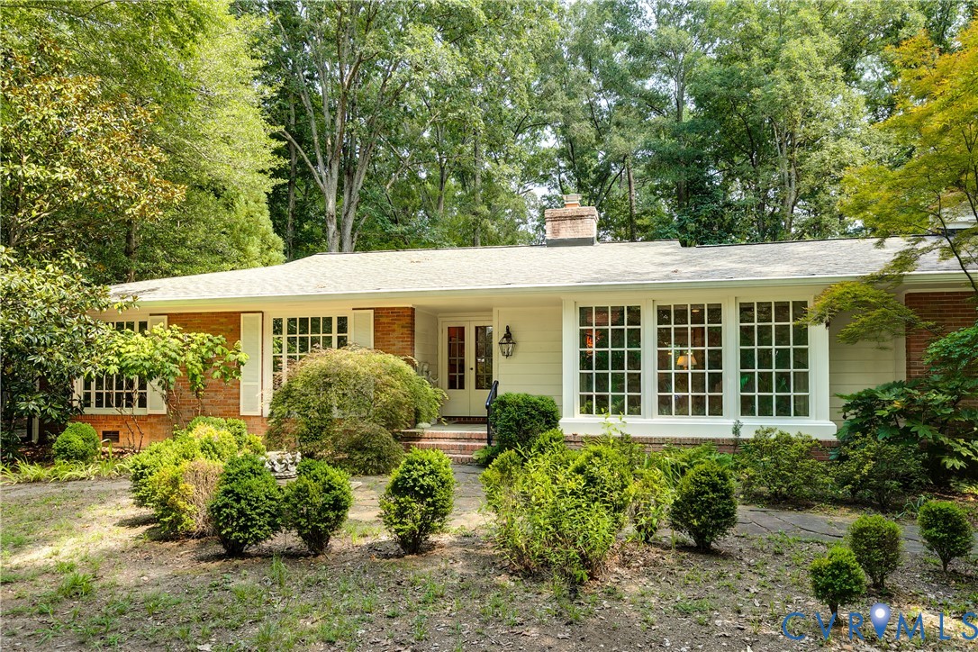 10475 Cherokee Road Richmond, VA 23235 - Photo 3 of 74 Brick and siding exterior featuring a prominent ba