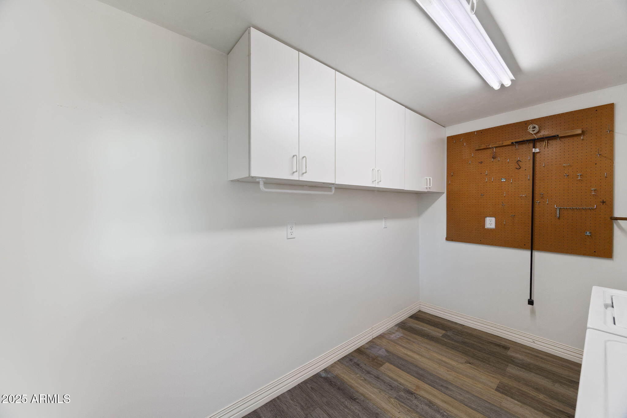 2209 Old Crooks Trail Overgaard, AZ 85933 - Photo 19 of 38 a view of room with wooden floor