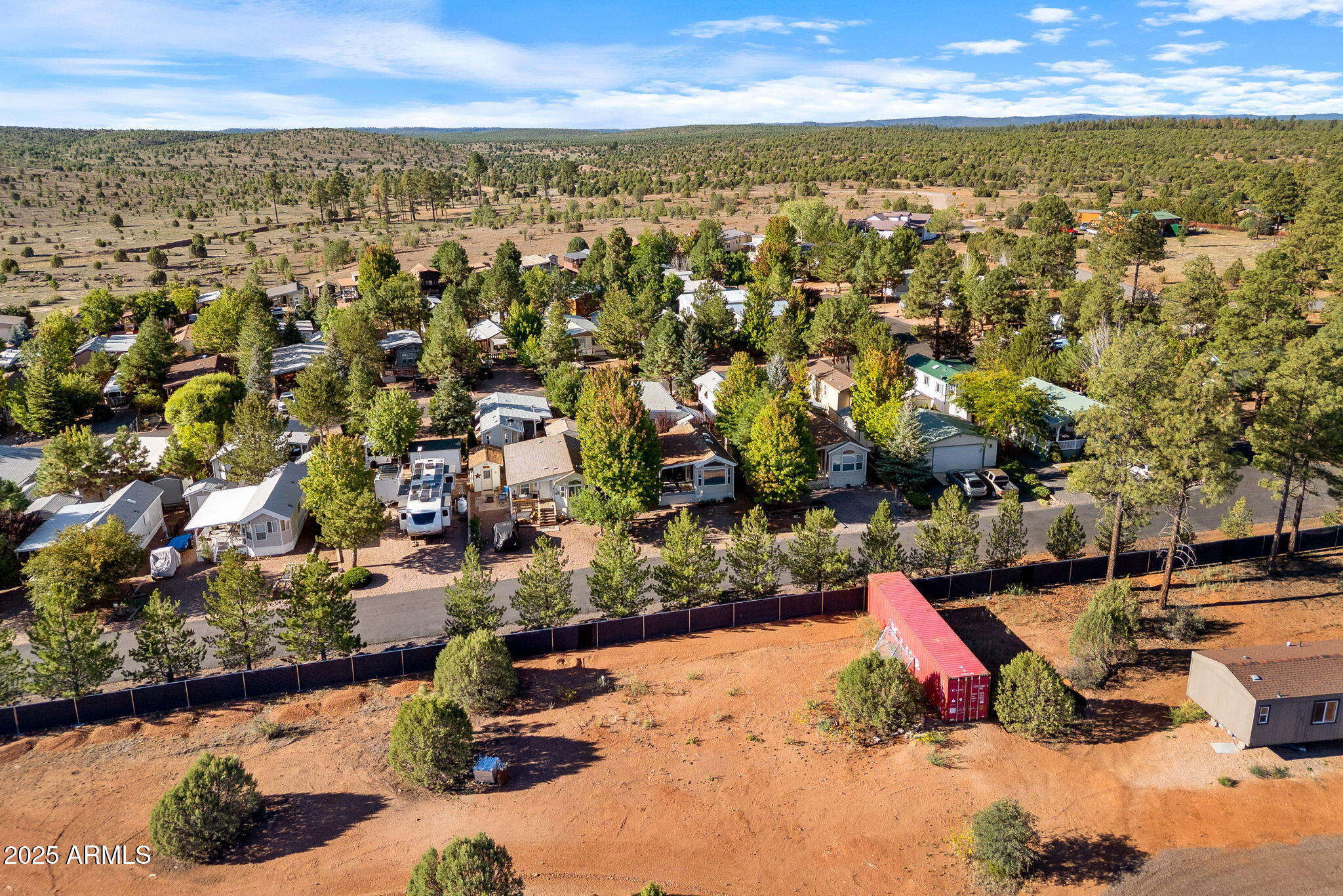 2209 Old Crooks Trail Overgaard, AZ 85933 - Photo 24 of 38 an aerial view of residential houses with outdoor space