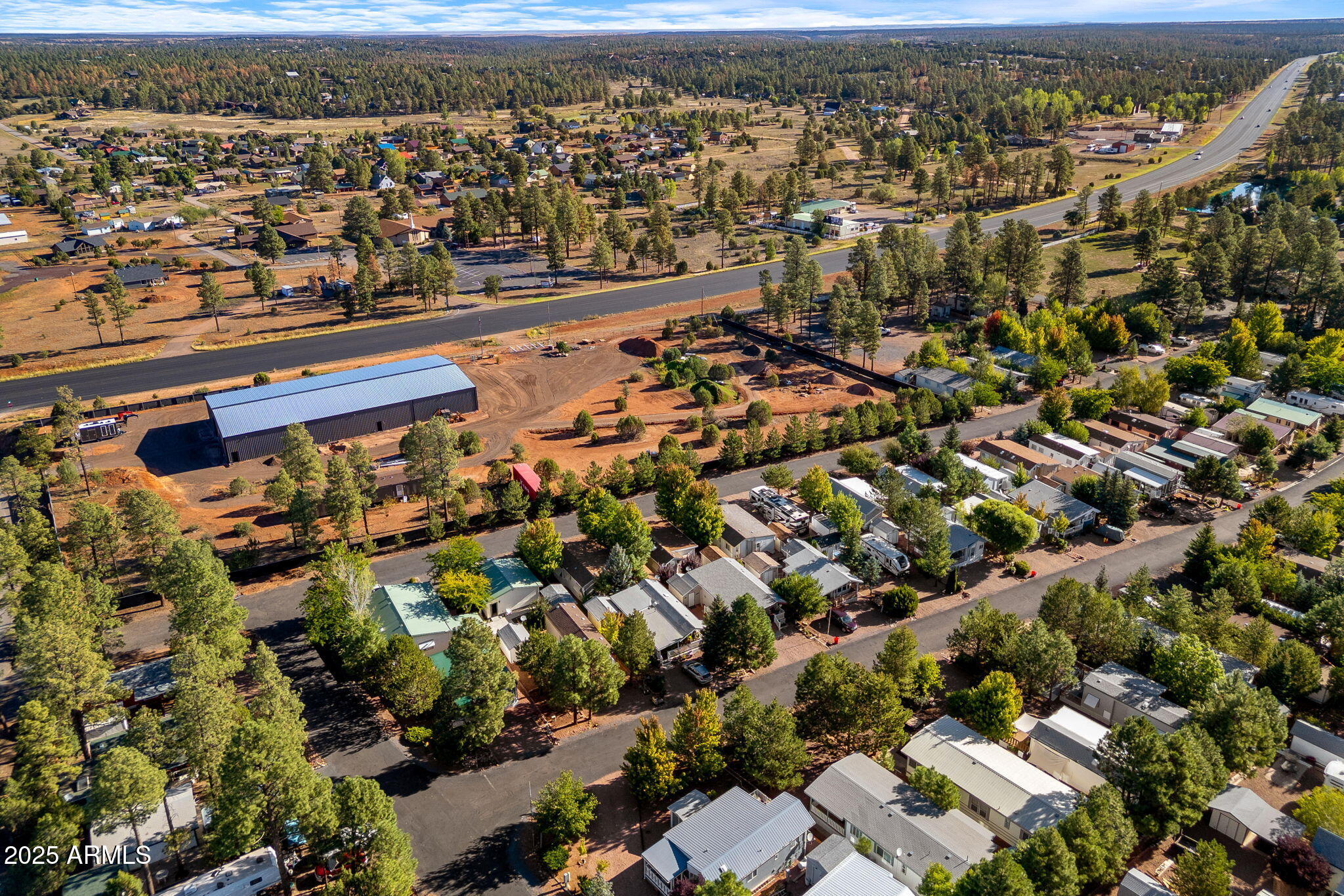2209 Old Crooks Trail Overgaard, AZ 85933 - Photo 26 of 38 an aerial view of residential houses with outdoor space