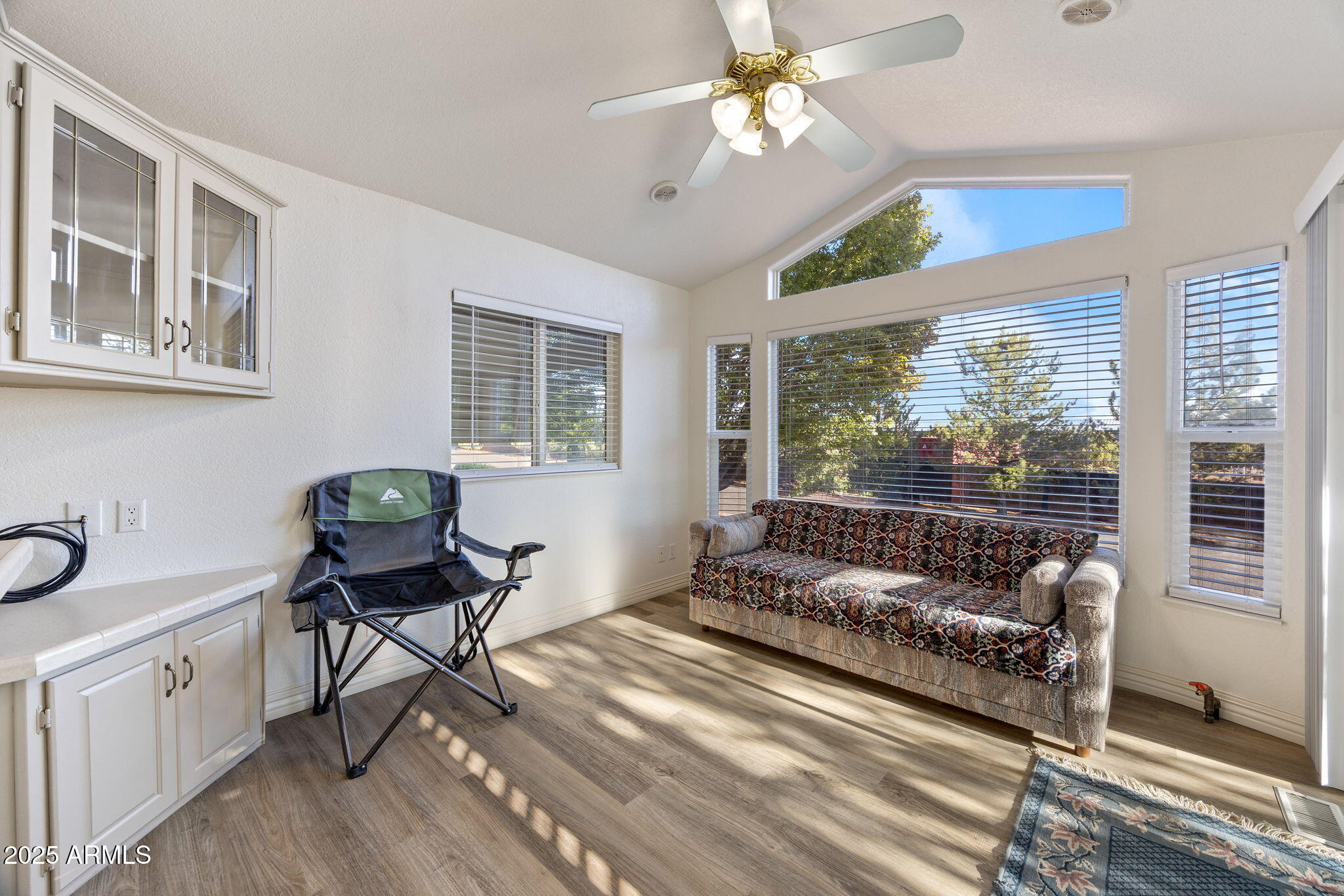 2209 Old Crooks Trail Overgaard, AZ 85933 - Photo 6 of 38 a living room with furniture and a window