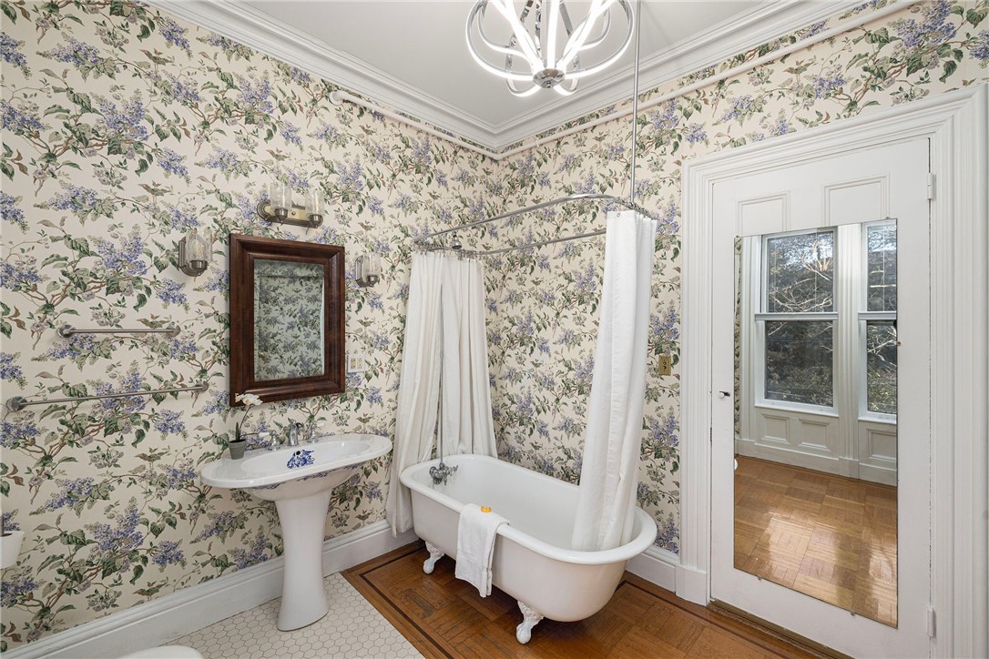 31 Old Beach Road Newport, RI 02840 - Photo 14 of 46 Large bathroom/dressing room with Juliette balcony.