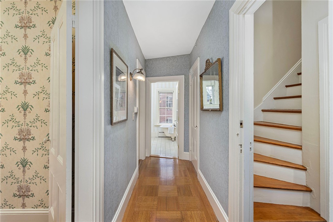 31 Old Beach Road Newport, RI 02840 - Photo 24 of 46 Second level hallway/suite area with a peek of the third floor staircase.