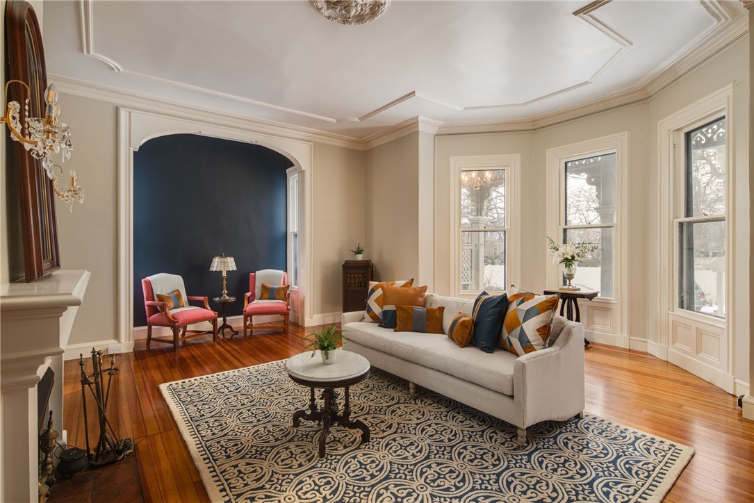 31 Old Beach Road Newport, RI 02840 - Photo 3 of 46 Family living room with fireplace. Now with two couches.