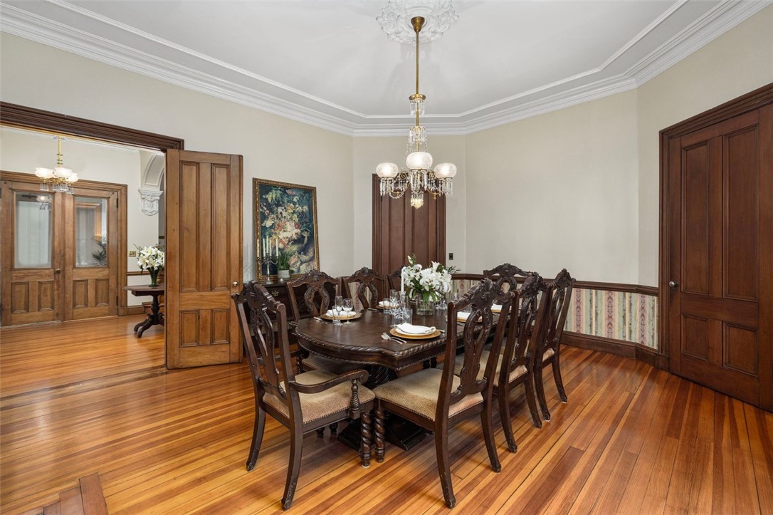 31 Old Beach Road Newport, RI 02840 - Photo 7 of 46 Eloquent dining room with original light fixtures.