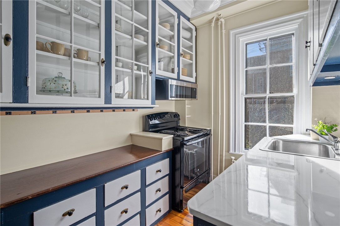 31 Old Beach Road Newport, RI 02840 - Photo 9 of 46 Prep kitchen with new marble counter top and tile backsplash.