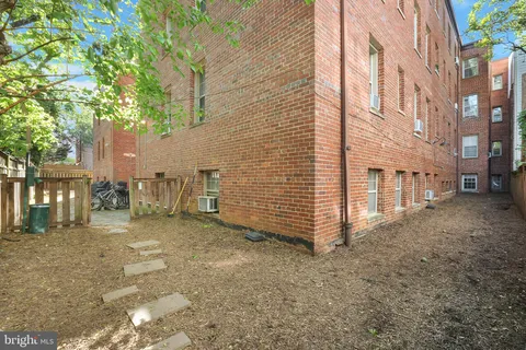 a backyard of a house with seating space