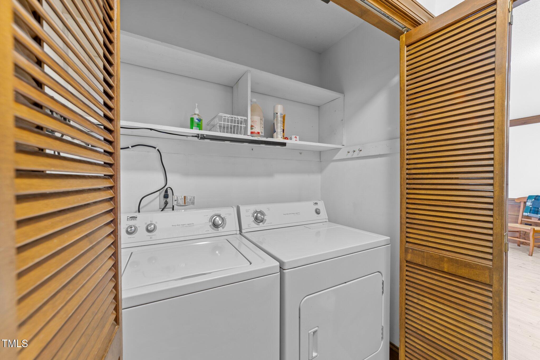 5012 Springwood Drive Raleigh, NC 27613 - Photo 22 of 44 a utility room with dryer and washer