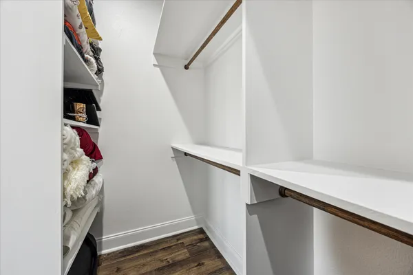 a view of entryway with stairs and wooden floor