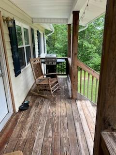 2902 Bacchus Road Elliston, VA 24087 - Photo 16 of 23 a view of balcony with wooden floor and outdoor seating