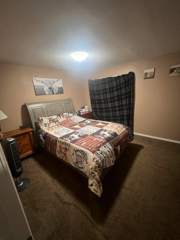 2902 Bacchus Road Elliston, VA 24087 - Photo 10 of 23 a bed sitting in a bedroom next to a window