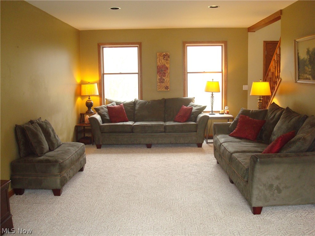 1733 Johns Road Clinton, OH 44216 - Photo 21 of 32 Very large living room. 9' ceiling thru-out the main level