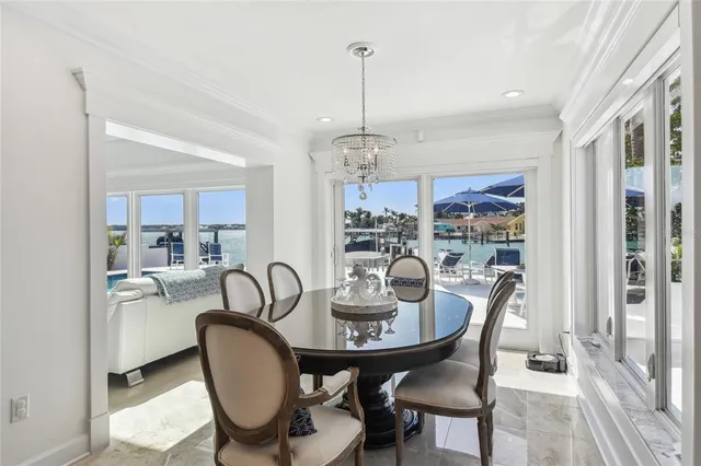 a view of a swimming pool with an outdoor seating