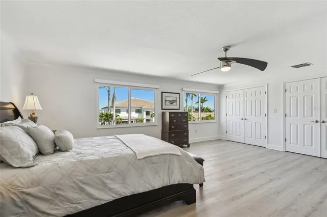 an aerial view of a city with lawn chairs