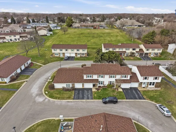 an aerial view of a house with a garden