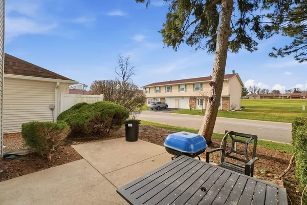 a view of a chairs and table on the terrace