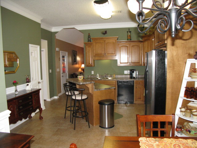 477 Bob White Road Macon, GA 31216 - Photo 10 of 21 a lobby with a chandelier and living room