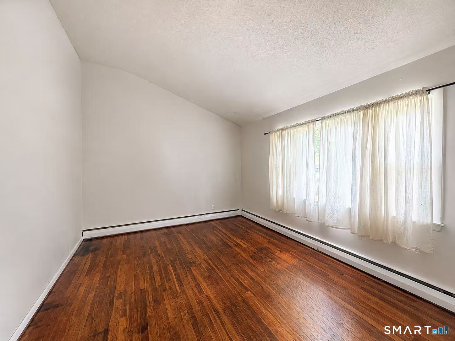 1122 Fienemann Road Farmington, CT 06032 - Photo 8 of 26 a view of an empty room and window