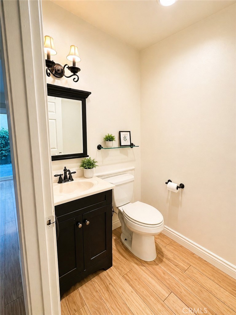 25 Brookfield Irvine, CA 92604 - Photo 5 of 17 a bathroom with a sink toilet and mirror