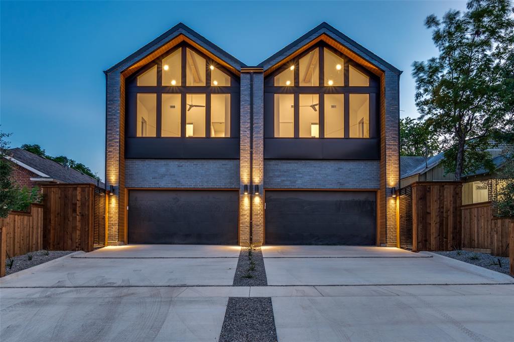 4515 Afton Street Dallas, TX 75219 - Photo 1 of 25 a view of brick house with large windows