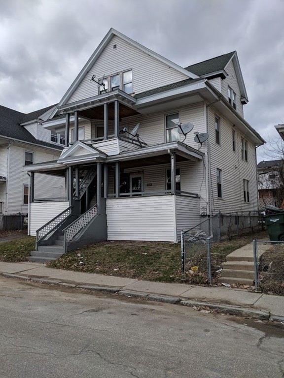 56 Windsor Street Springfield, MA 01105 - Photo 1 of 14 front view of a house with a street