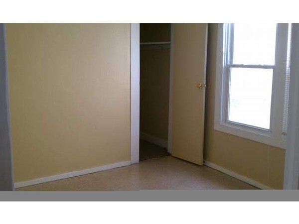 56 Windsor Street Springfield, MA 01105 - Photo 13 of 14 a open space with a window