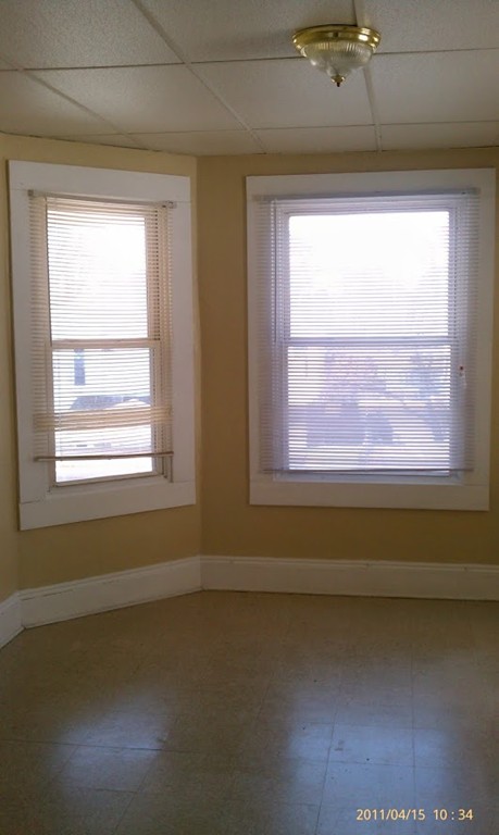 56 Windsor Street Springfield, MA 01105 - Photo 5 of 14 a view of a room that has a window in it
