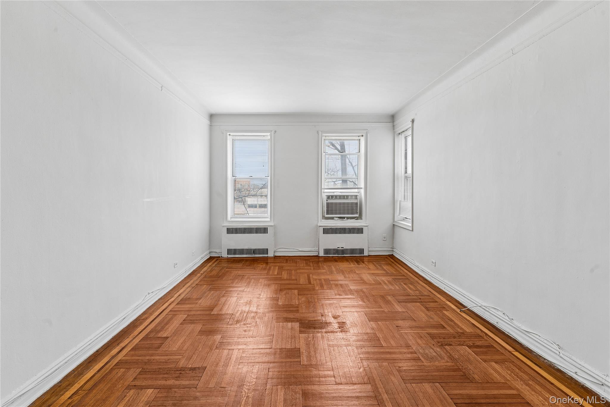 111-39 76th Road, Unit D8 Queens, NY 11375 - Photo 11 of 17 Gracious space. Parquet floors with mahogany trim