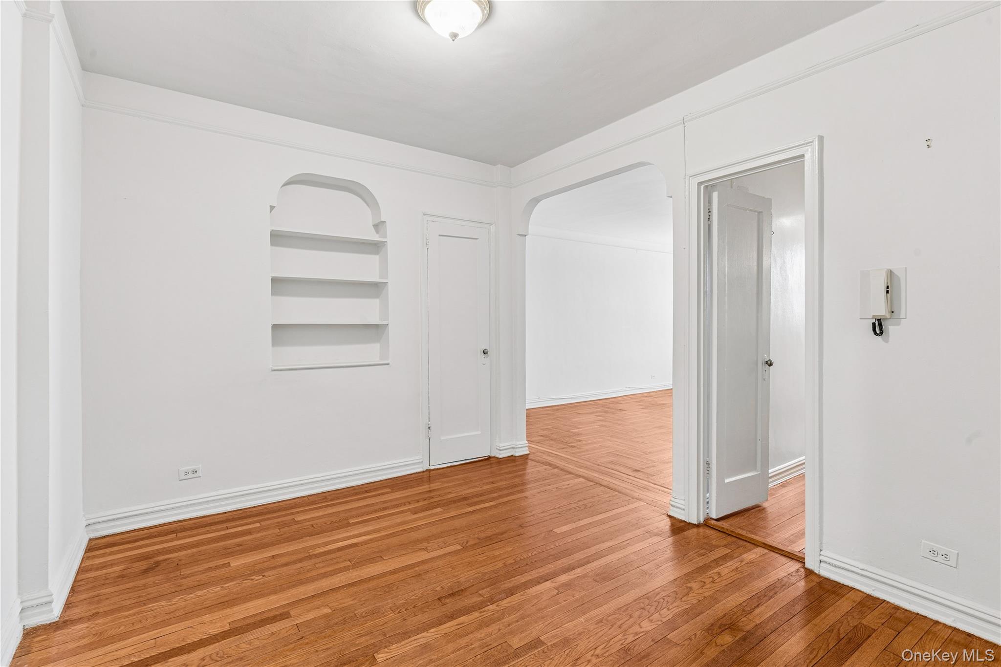 111-39 76th Road, Unit D8 Queens, NY 11375 - Photo 5 of 17 Adaptable space for dining or home office. Prewar details