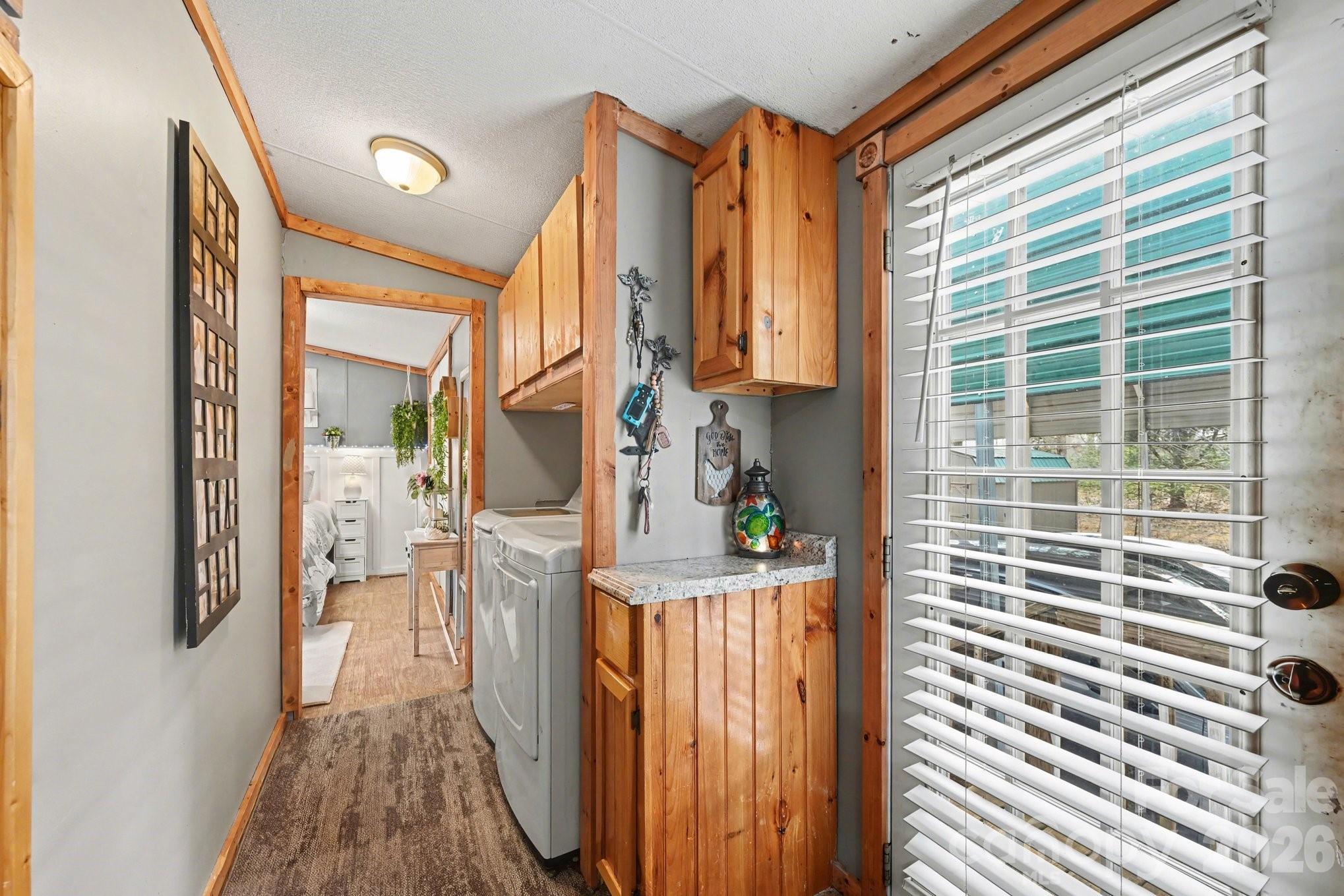 5431 Polkville Road Casar, NC 28020 - Photo 14 of 24 a kitchen with a window and a refrigerator