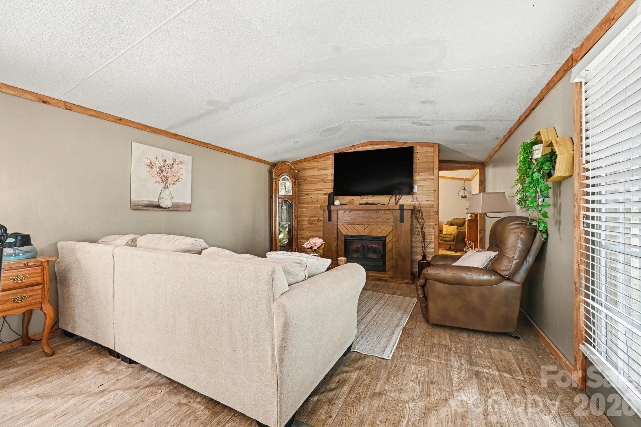 5431 Polkville Road Casar, NC 28020 - Photo 7 of 24 a living room with furniture and a flat screen tv