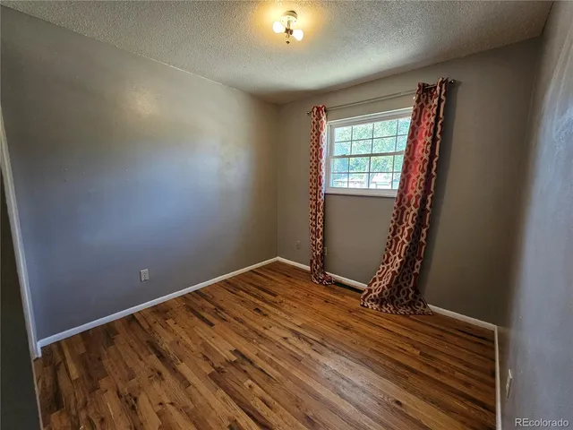 a view of a room with a flat screen tv