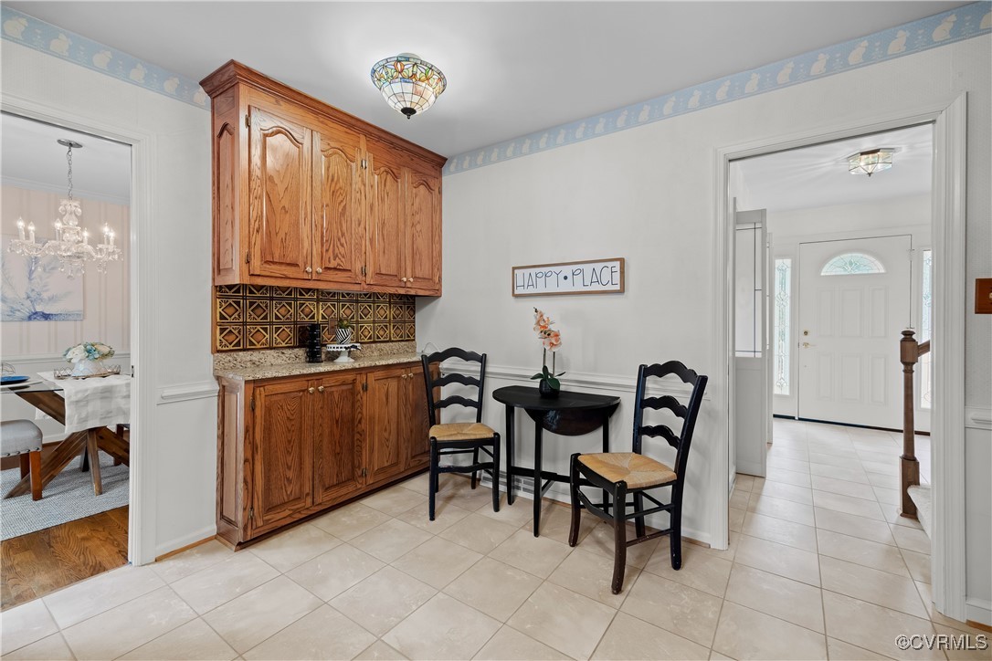 3510 Wood Dale Road Chester, VA 23831 - Photo 13 of 50 a view of kitchen with cabinets and window