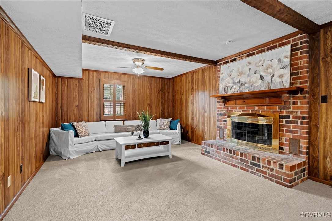 3510 Wood Dale Road Chester, VA 23831 - Photo 14 of 50 a living room with furniture and a fireplace