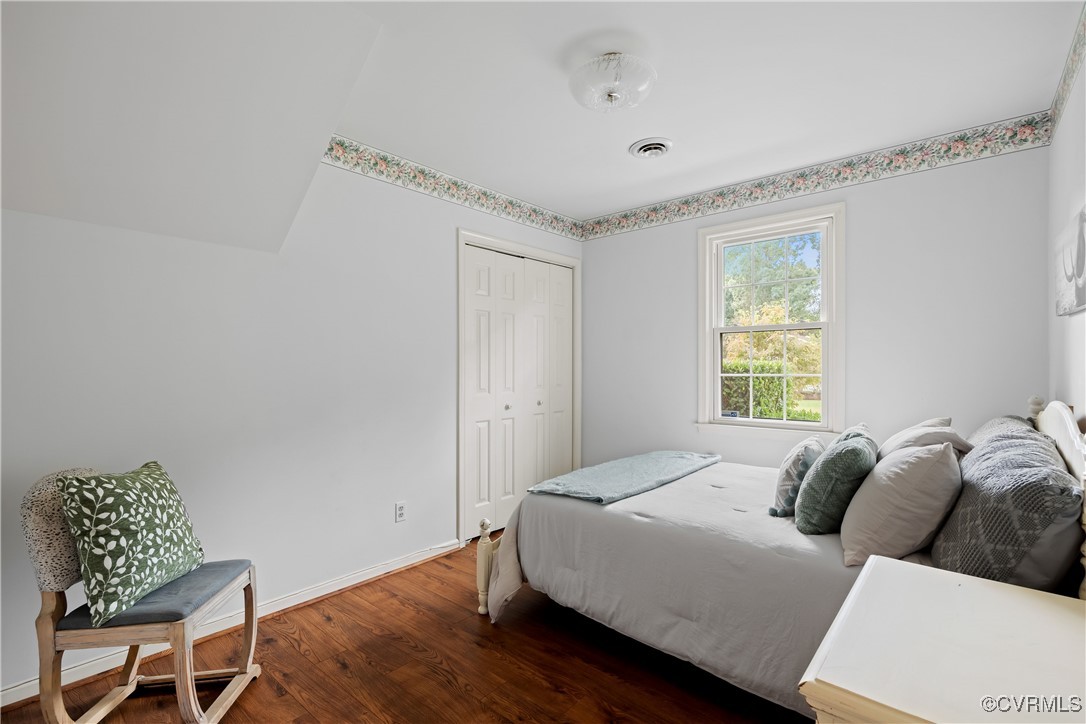 3510 Wood Dale Road Chester, VA 23831 - Photo 16 of 50 a room with a bed and a chair